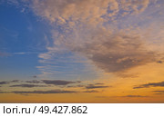 Sunset colorful sky background orange and blue. Стоковое фото, агентство Ingram Publishing / Фотобанк Лори