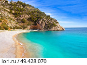 La Granadella beach in Mediterranean Javea also Xabia in Alicante Spain. Стоковое фото, агентство Ingram Publishing / Фотобанк Лори