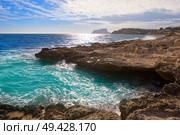 Moraira coast with Ifach of Calpe in Alicante of spain. Стоковое фото, агентство Ingram Publishing / Фотобанк Лори