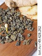 set  with high quality jasmine green tea and ginger. close up. Стоковое фото, агентство Ingram Publishing / Фотобанк Лори