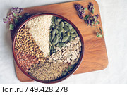 Spices and herbs in ceramic bowl. seasoning. Colorful natural additives. Стоковое фото, агентство Ingram Publishing / Фотобанк Лори
