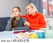 Sad teen girl after discord with her mother. Стоковое фото, фотограф Яков Филимонов / Фотобанк Лори