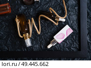 set of nature precious oils and  cosmetics on black background . Стоковое фото, агентство Ingram Publishing / Фотобанк Лори