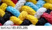 A colorful piece of fabric with a pattern of different colored strings. Стоковое AI-изображение, AI-художник Ярославский Максим / Фотобанк Лори