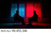 Two men are sitting in chairs in front of a window. Стоковое AI-изображение, AI-художник Ярославский Максим / Фотобанк Лори