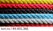 A row of colorful ropes are shown in a close up. Стоковое AI-изображение, AI-художник Ярославский Максим / Фотобанк Лори