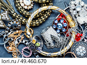 Mix of beautiful jewellery.Collection of bijouterie.Fashion jewels.Jewelery texture. Jewelry and bijouterie. Стоковое фото, агентство Ingram Publishing / Фотобанк Лори