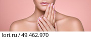 Beauty Woman with perfect Makeup and Manicure. Glamour Girl. Pink Lips and Nails. Skin care foundation. Beauty girls Face isolated on light Background. Fashion photo. Стоковое фото, агентство Ingram Publishing / Фотобанк Лори