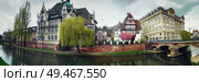 Beautiful spring panorama of Strasbourg city in front of international lyceum Des Pontonniers along canal du Faux-Rempart, Quai Lezay-Marnesia. Стоковое фото, агентство Ingram Publishing / Фотобанк Лори