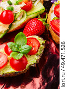 Bruschetta with various toppings.Assortment of italian traditional bruschetta.Summer party.Mix bruschetta. Bruschetta with various toppings. Стоковое фото, агентство Ingram Publishing / Фотобанк Лори