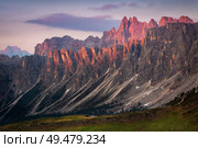 view of sunset in summer on mountain range Lastoni di Formin and Croda da Lago from Passo di Giau, Colle Santa Lucia, Dolomites, Italy. sunset in summer on mountain range Lastoni di Formin and Croda da Lago, Dolomites, Italy. Стоковое фото, агентство Ingram Publishing / Фотобанк Лори