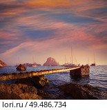 Ibiza cala d Hort with Es Vedra islet sunset in Sant Josep of Balearic Islands. Стоковое фото, агентство Ingram Publishing / Фотобанк Лори