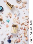 precious skin care cosmetics around  natural shells and gemstones. close up. Стоковое фото, агентство Ingram Publishing / Фотобанк Лори