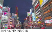 Osaka, Japan - Sep 22 2024, 4k, Panoramic view of Dotonbori street with various cafes, restaurants, bright signs and advertisements, illumination, a lot of people walking, at night, Osaka, Japan. Редакционное видео, видеограф Сергей Богомяко / Фотобанк Лори
