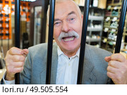 businessman in prison for monetary fraud. Стоковое фото, агентство Ingram Publishing / Фотобанк Лори