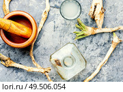 Traditional alcoholic drink from horseradish roots.Russian or Ukrainian cuisine. Alcoholic drink on horseradish. Стоковое фото, агентство Ingram Publishing / Фотобанк Лори