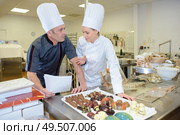 concept of chocolatiers at work. Стоковое фото, агентство Ingram Publishing / Фотобанк Лори