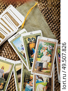 divination card Tarot set up with pouch. close up. Редакционное фото, агентство Ingram Publishing / Фотобанк Лори
