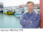 a man on the port. Стоковое фото, агентство Ingram Publishing / Фотобанк Лори
