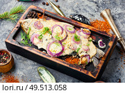 Baked fish at the Christmas table.Holiday food.Baked crucian.Fish food.. Baked fish for christmas. Стоковое фото, агентство Ingram Publishing / Фотобанк Лори