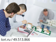 young students of architect faculty with coach. Стоковое фото, агентство Ingram Publishing / Фотобанк Лори
