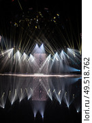 rays of light illuminate the scene at the concert. Стоковое фото, агентство Ingram Publishing / Фотобанк Лори