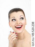The portrait of the enthusiastic beautiful young woman isolated. Стоковое фото, агентство Ingram Publishing / Фотобанк Лори