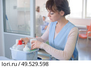portrait of hospital janitorial staff. Стоковое фото, агентство Ingram Publishing / Фотобанк Лори