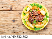 Danish meat baked with new potatoes.Roasted meat. Baked meat with potatoes. Стоковое фото, агентство Ingram Publishing / Фотобанк Лори