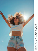 A woman stands with her arms raised high in the air. Стоковое AI-изображение, AI-художник Данила Большаков / Фотобанк Лори