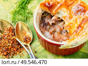 Baked seafood with bread cap.Squid and mussel julienne.Cream seafood soup.. Seafood soup or julienne. Стоковое фото, агентство Ingram Publishing / Фотобанк Лори