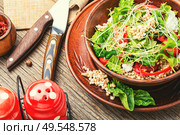 Dietary salad with sprouted green buckwheat, celery, tomato and microgreens.. Vegetables salad of buckwheat. Стоковое фото, агентство Ingram Publishing / Фотобанк Лори
