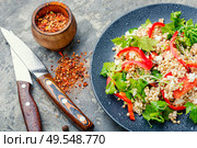 Green buckwheat vegetable salad with celery stalks, microgreens and spinach. Fresh salad in plate. Стоковое фото, агентство Ingram Publishing / Фотобанк Лори