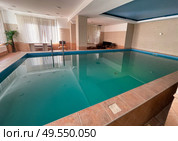 Swimming pool in the hotel in Zelenogradsk, Russia. Редакционное фото, фотограф Татьяна Кахилл / Фотобанк Лори