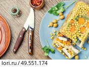 Jellied, cold dish of fish, filled with gelatinous broth.Russian food. Tasty aspic fish. Стоковое фото, агентство Ingram Publishing / Фотобанк Лори