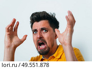The man is afraid of fear. Стоковое фото, агентство Ingram Publishing / Фотобанк Лори