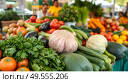 Customers buy fresh organic products at the farmer's market. Farmers' markets as a convenient way for people to sell and buy agricultural products.traditional way of selling agricultural products. Стоковое AI-изображение, AI-художник Iva Noel / Фотобанк Лори