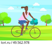 Woman cycling in park, afro-american lady riding on bike, teenage girl at bicycle cartoon character. Vector female ride on cycle, active way of life. Woman Cycling in Park, Afro Lady Riding on Bike. Стоковая иллюстрация, агентство Ingram Publishing / Фотобанк Лори