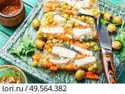 Jellied, cold dish of fish, filled with gelatinous broth.Russian food.Fish food.. Tasty aspic fish. Стоковое фото, агентство Ingram Publishing / Фотобанк Лори