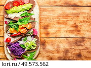 Healthy vegan tacos.Healthy vegan salad tortilla wraps and vegetables. Mexican vegetarian taco. Стоковое фото, агентство Ingram Publishing / Фотобанк Лори
