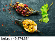Roasted mackerel or scomber in grape berry sauce. Fish food. Scomber with grape sauce. Стоковое фото, агентство Ingram Publishing / Фотобанк Лори