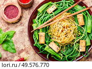 Salad with pasta, asparagus beans,fried cheese,mung bean, and okra.. Oriental vegetable salad with pasta. Стоковое фото, агентство Ingram Publishing / Фотобанк Лори