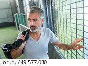 man in sports gym. Стоковое фото, агентство Ingram Publishing / Фотобанк Лори