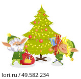 Elves fairy characters holding sack and presents near Christmas tree decorated by garland. Card with funny gnome hero in traditional costume near fir-tree. Xmas assistant with bag and gift box vector. Christmas Elf with Present near Fir-tree Vector. Стоковая иллюстрация, агентство Ingram Publishing / Фотобанк Лори
