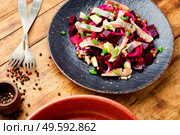 Salad with salted herring,beets,onions and green peas.. Classic herring salad. Стоковое фото, агентство Ingram Publishing / Фотобанк Лори