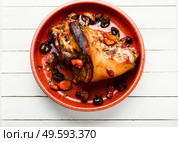 German cuisine meat dish of pork leg and pork knuckle.. Roasted pork knuckle,traditional German cuisine. Стоковое фото, агентство Ingram Publishing / Фотобанк Лори