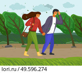 Woman and man in casual clothes walk in the park on the road along the tree alley in windy weather. Strong wind blows, trees bend to the ground, leaves are flying, young people smiling holding hands. Woman and man in casual clothes walk in the park on the road along the tree alley in windy weather. Стоковая иллюстрация, агентство Ingram Publishing / Фотобанк Лори