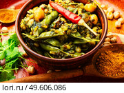 Kitchari,stewed rice with mash and spices fried in oil. Kitchari, a spicy vegetarian dish. Стоковое фото, агентство Ingram Publishing / Фотобанк Лори
