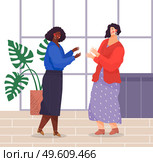 Two women standing and talking in office. Dark-skinned girl wears jewelry, blue blouse, denim skirt, white-skinned girl wears sweater, patterned dress. Women laugh and gesticulate in modern office. Two women friendly chatting in office. Panoramic window, lush pot plant, tiled floor. Office staff. Стоковая иллюстрация, агентство Ingram Publishing / Фотобанк Лори