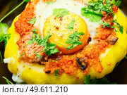 Squash stuffed with couscous and mushrooms. Baked patisson with shakshuka.Close up. Baked stuffed squash or patisson. Стоковое фото, агентство Ingram Publishing / Фотобанк Лори